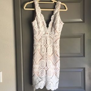 White lace dress with tan lining